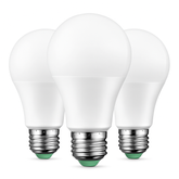 Three LED light bulbs with silver bases on a white background