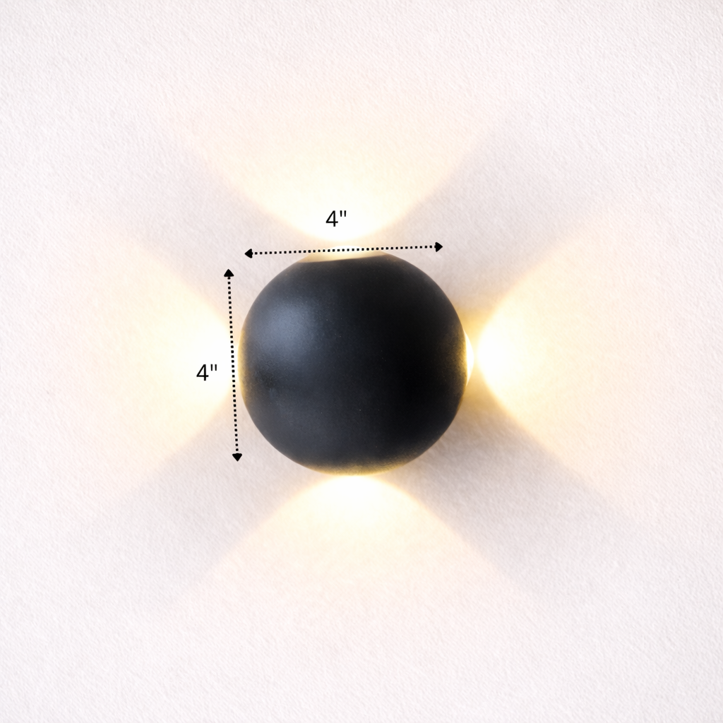 Black spherical wall light fixture on a white wall with dimensions indicated.