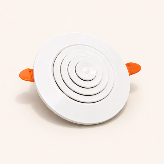 White recessed ceiling diffuser with concentric airflow vent design