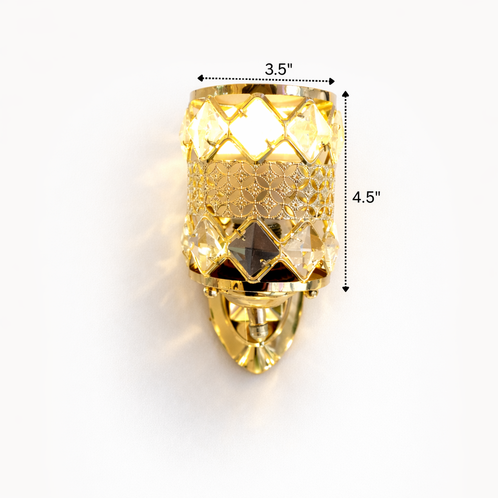Gold wall sconce with measurements on a white background