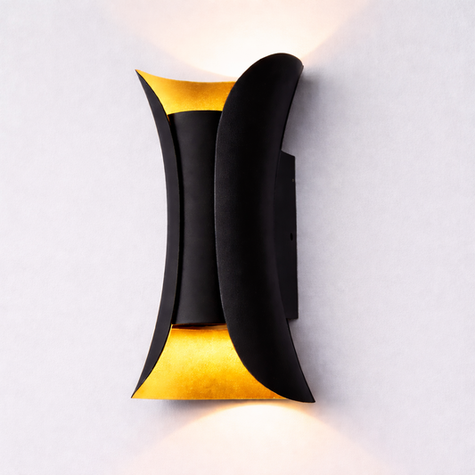 "Modern black and gold wall light for luxury interiors."