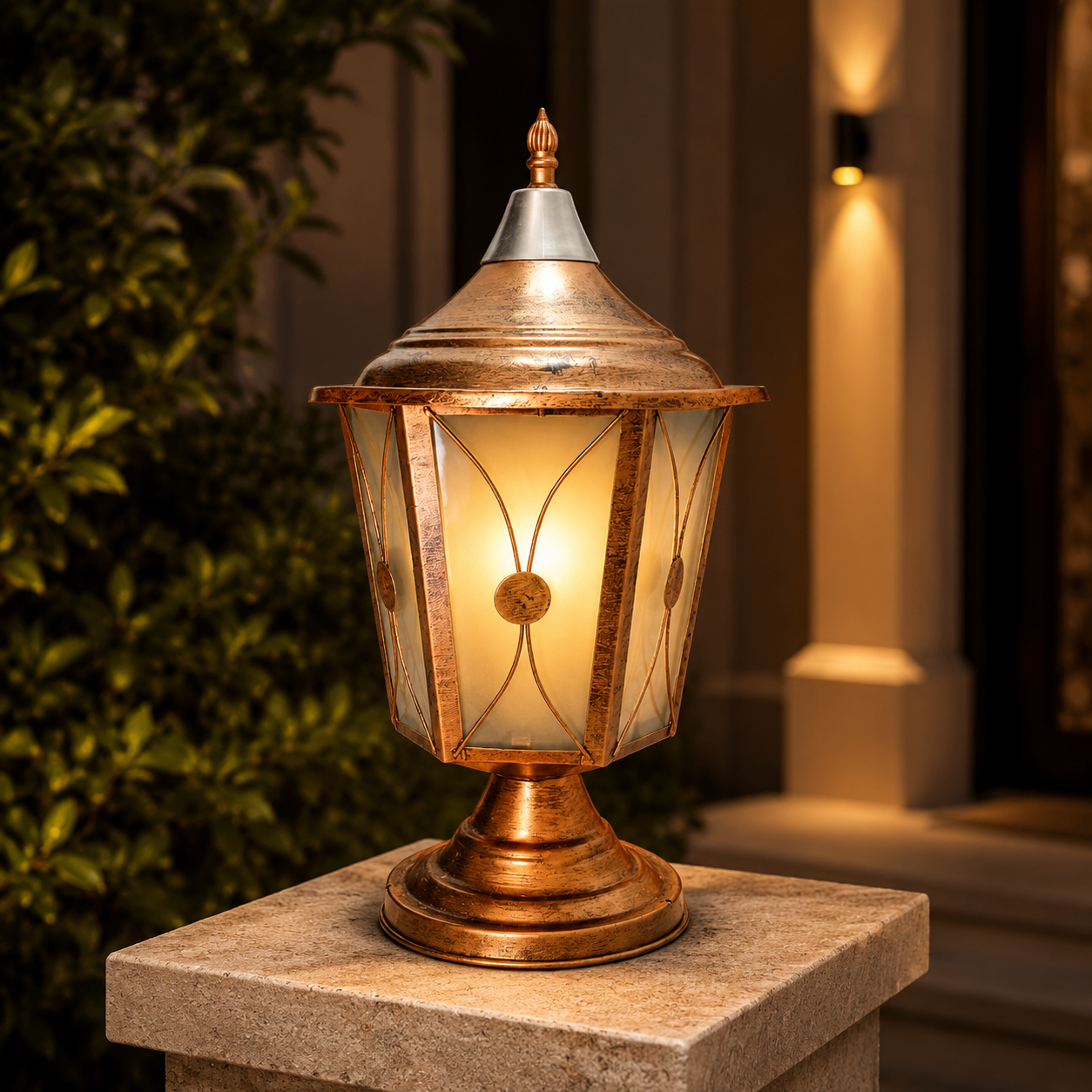 Decorative outdoor lamp on a stone pedestal with a warm glow.