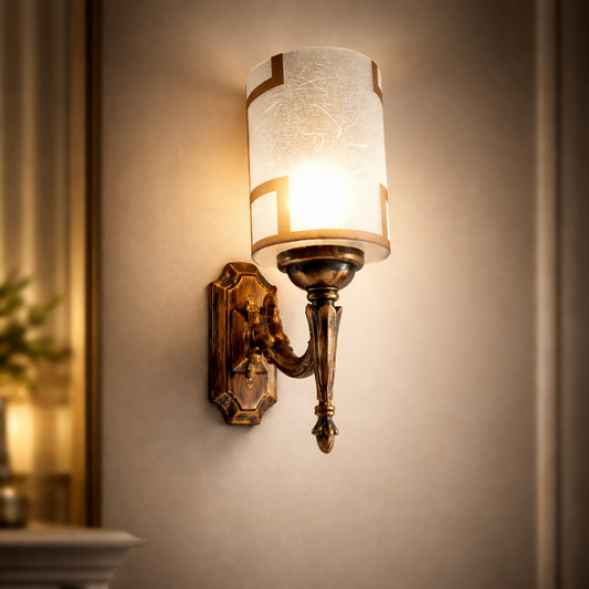 Vintage wall sconce glowing on elegant indoor feature wall