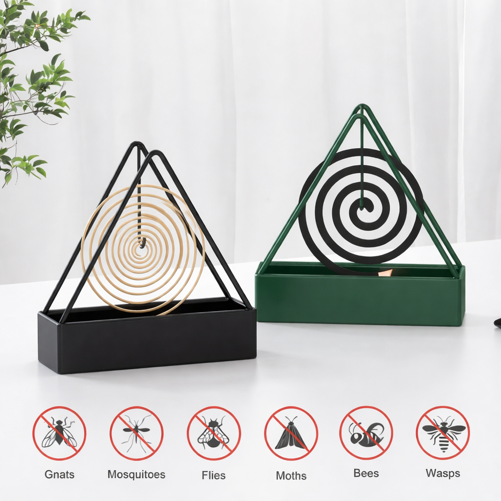 Two triangular insect traps with spiral designs on a white surface, featuring icons below indicating their uses.