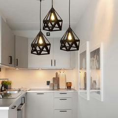   "Modern black geometric pendant light with polygonal metal cage design