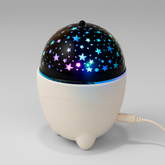 Starry night light projector with colorful star patterns on a gray background