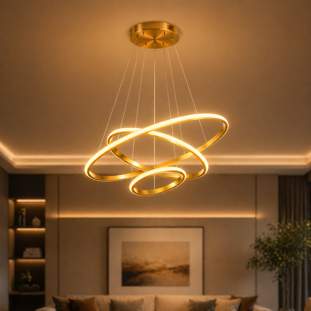 Modern chandelier with three interlocking rings in a living room setting.