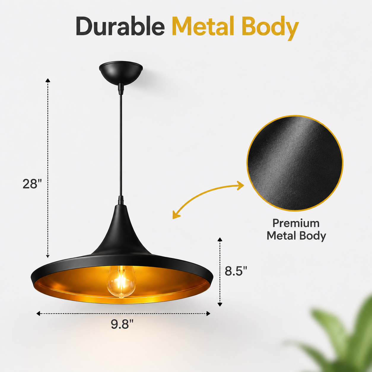 "Stylish black and gold pendant light with amber glow"