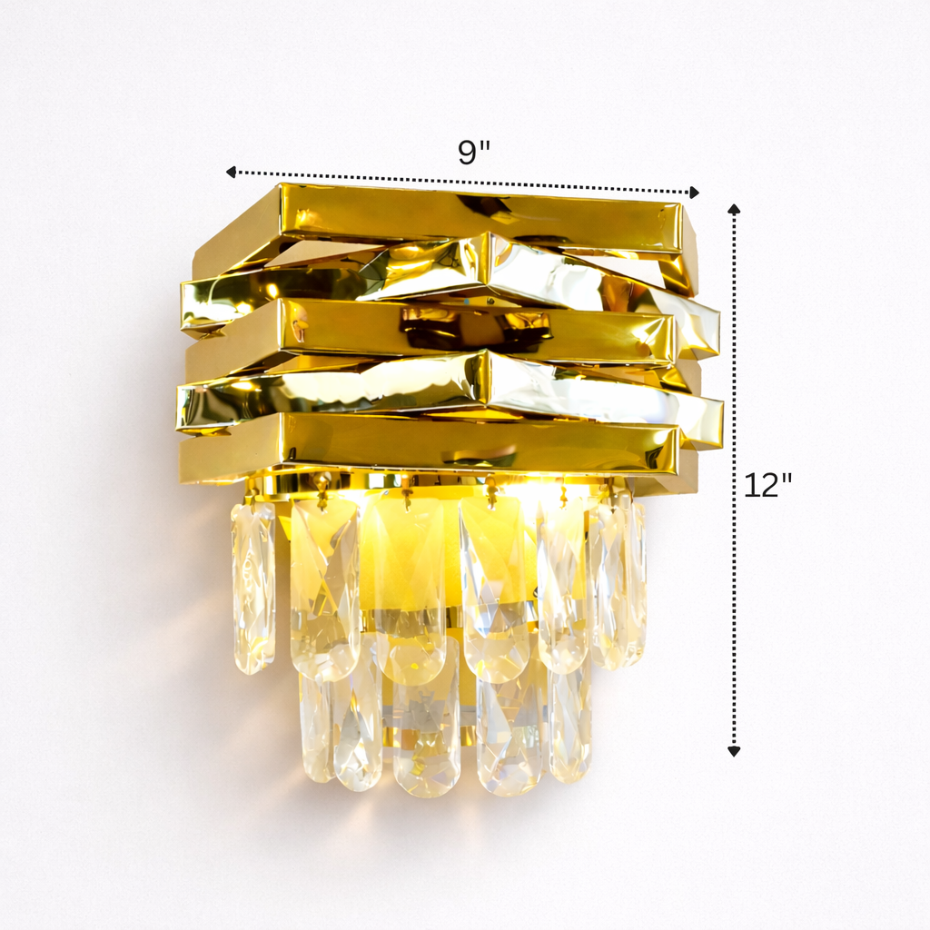 Gold wall sconce with crystal accents and measurements on a white background