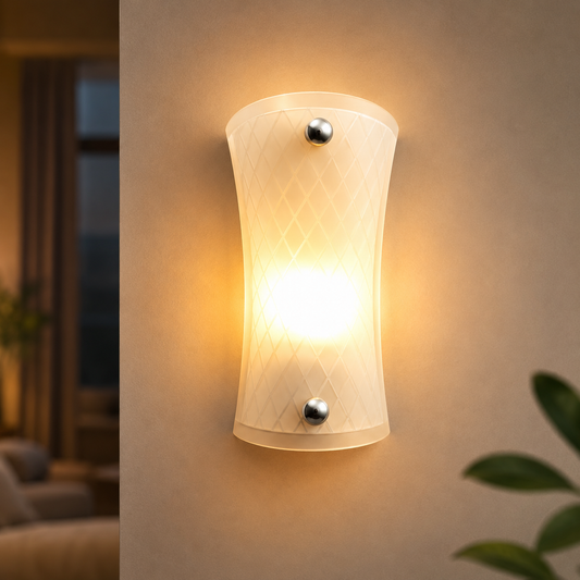 Wall-mounted light fixture on a wall with a blurred indoor background