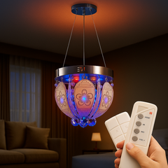 Crystal chandelier hanging from living-room ceiling, night glow