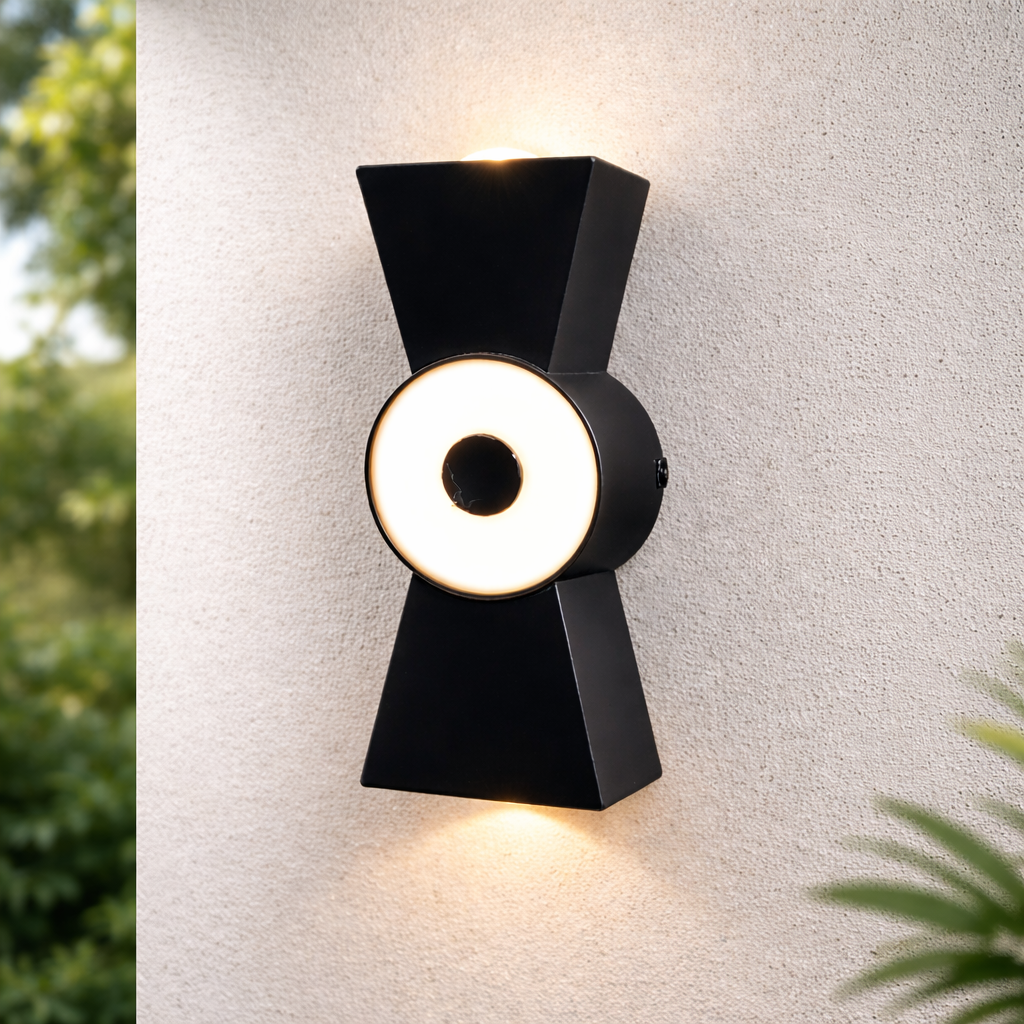 modern black LED wall light glowing on exterior wall