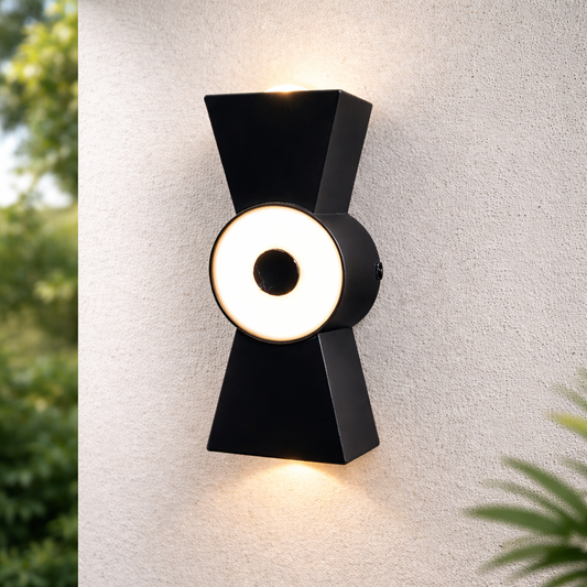 modern black LED wall light glowing on exterior wall