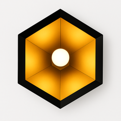 Hexagonal wall light fixture with a glowing bulb on a white background