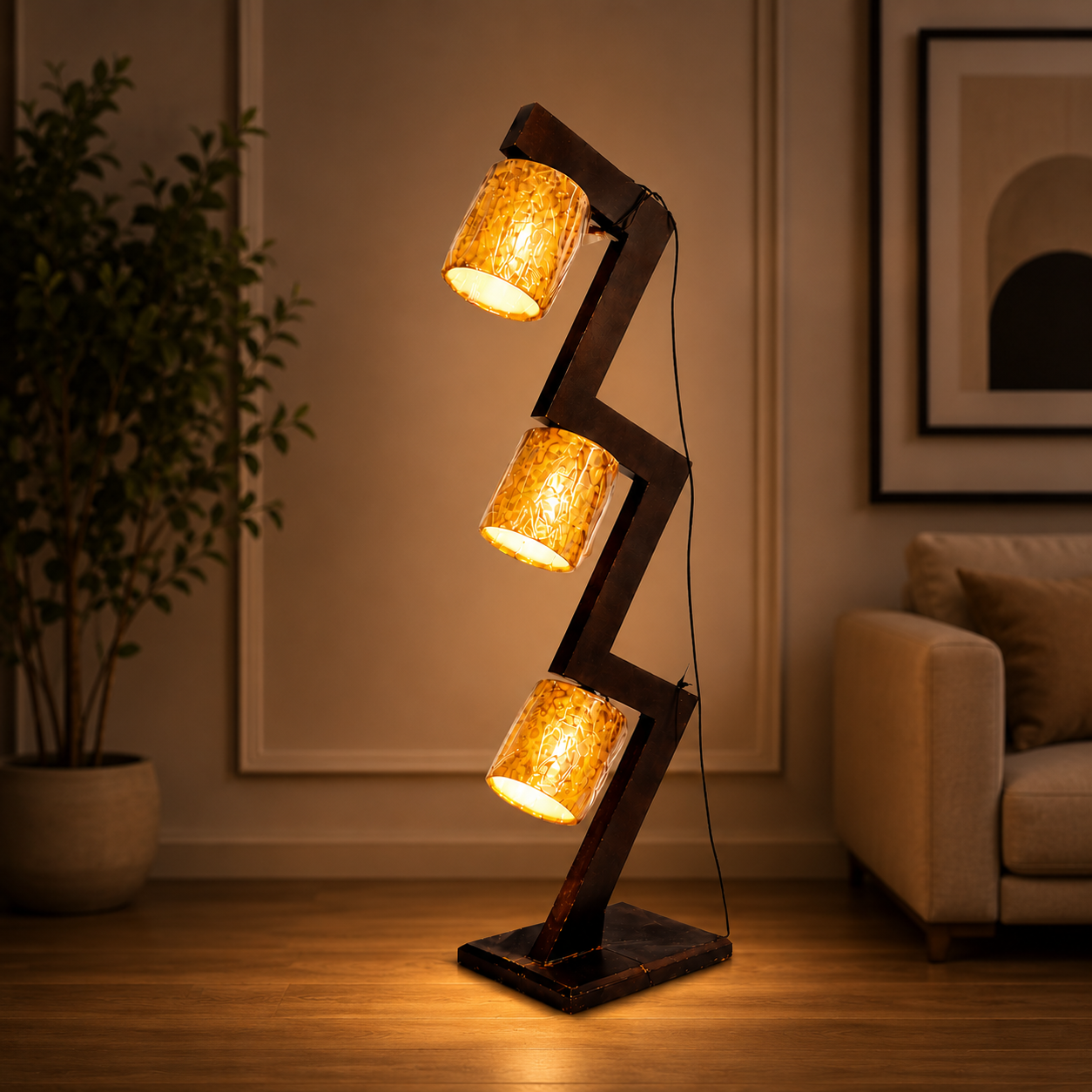 Modern floor lamp with three glass shades in a living room setting.