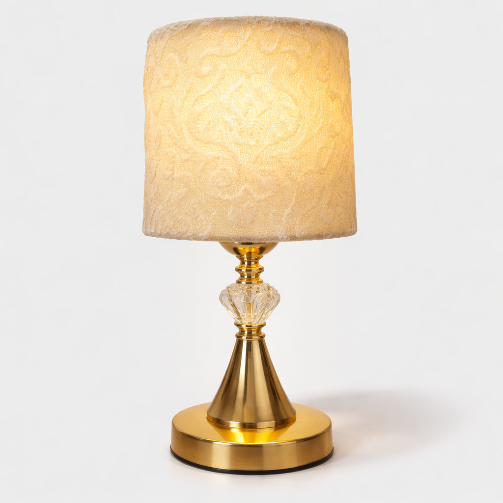 “Gold table lamp with fabric shade for bedroom décor”