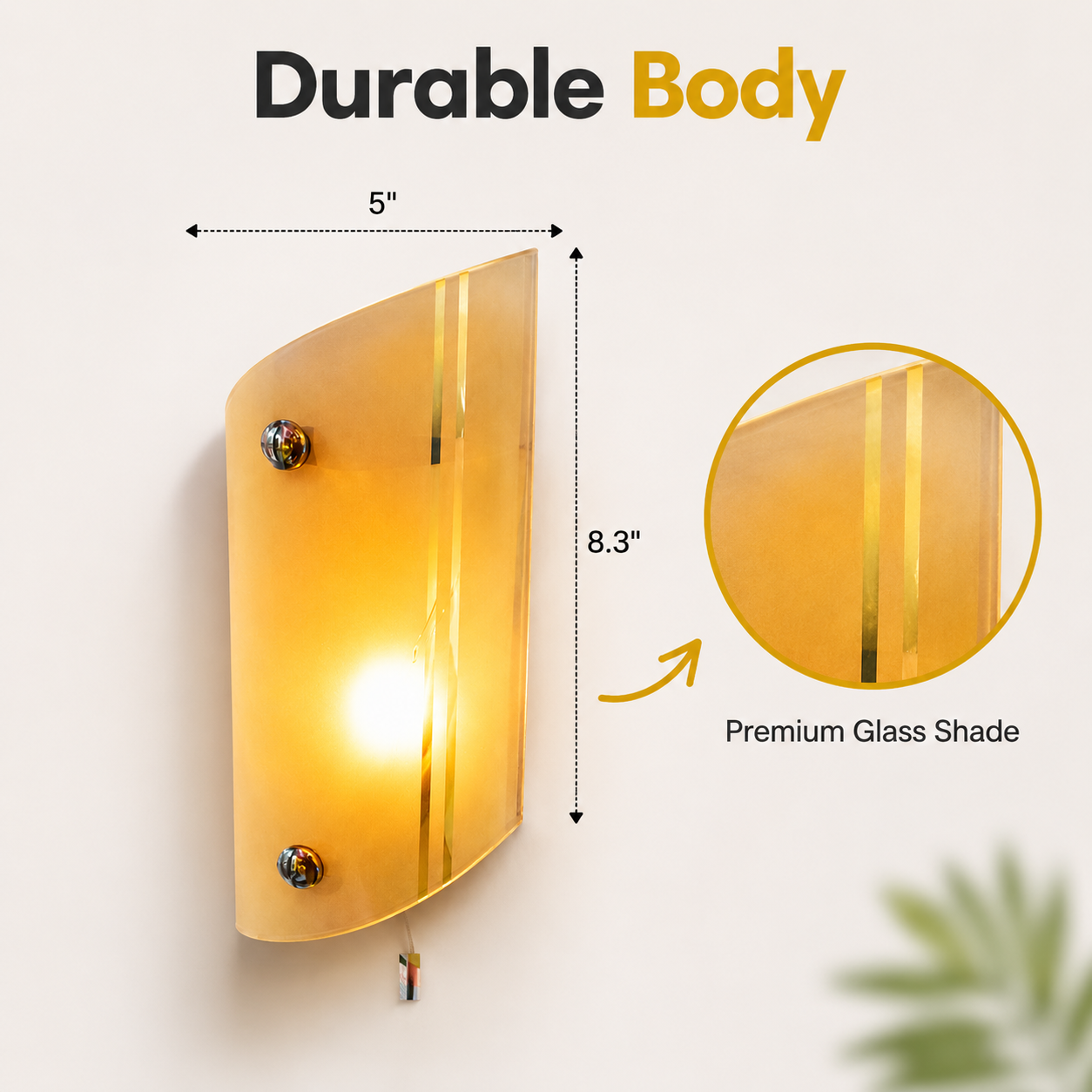 Wall sconce with gold glass shade and measurements on a white background