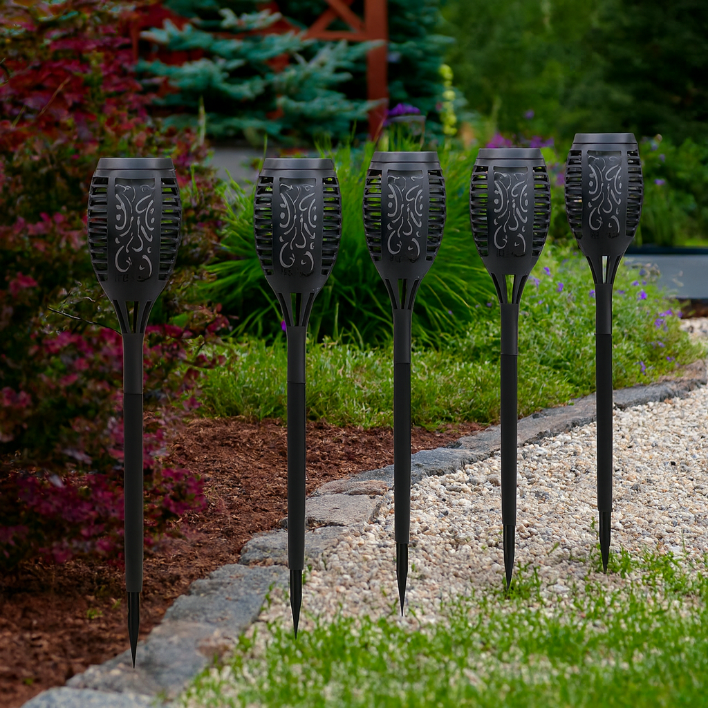 Set of six waterproof solar flame torches for outdoor garden lighting with realistic LED flame design and easy setup