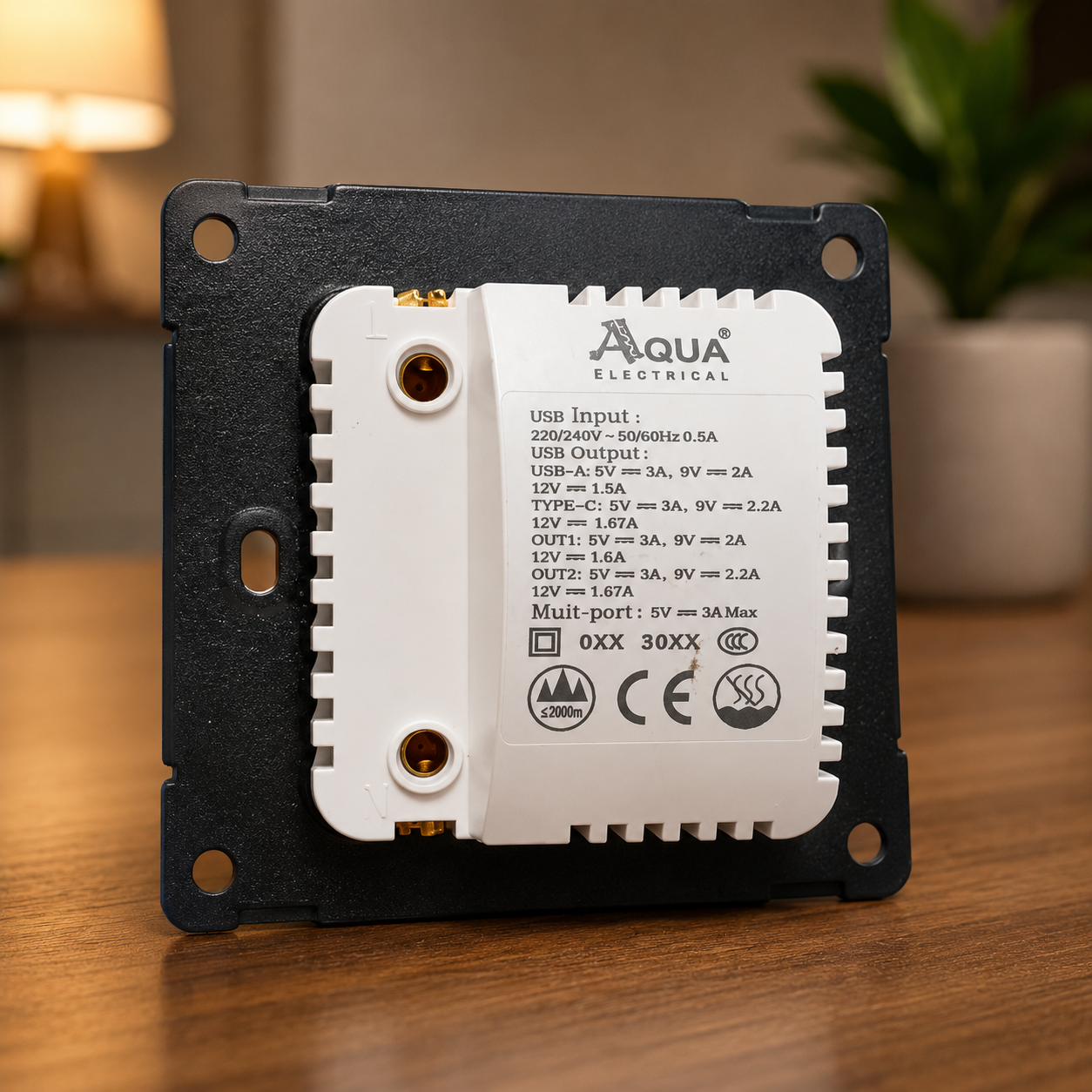 Aqua Electrical component on a wooden surface with a blurred background