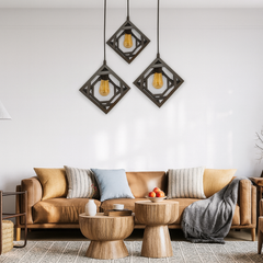 Modern geometric pendant lights illuminating a cozy living room interior”