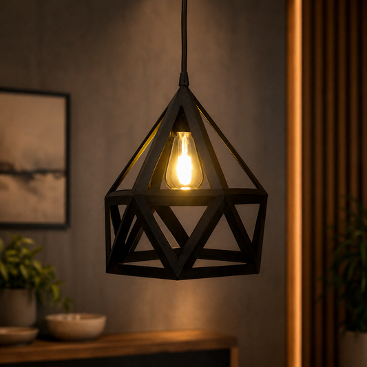 Geometric black pendant light hanging in a dimly lit room with a warm ambiance.
