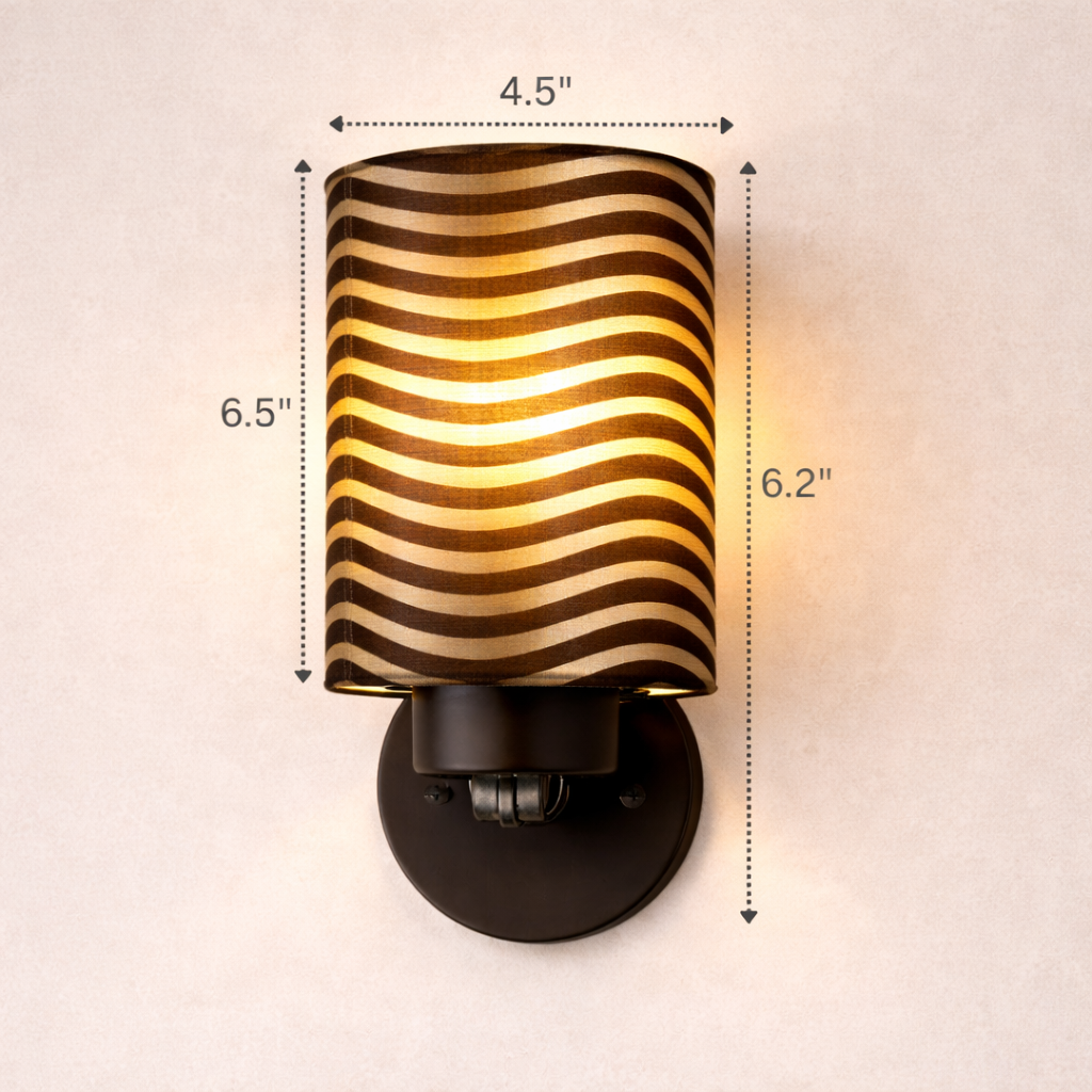 Wall sconce with wavy glass shade and dimensions on a plain background