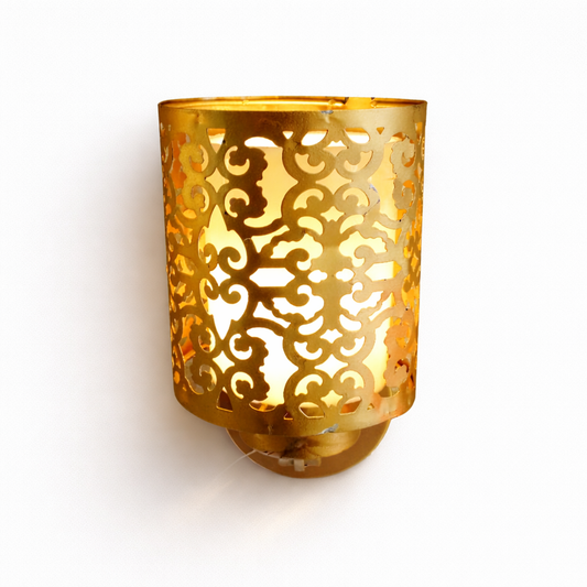 Gold decorative wall lamp with metal cutwork and warm glow