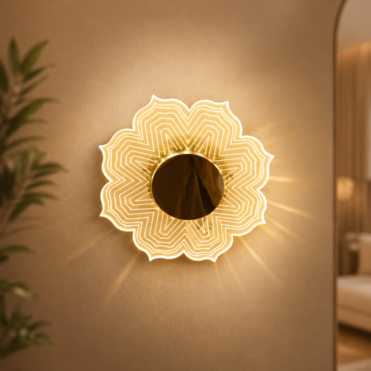 Decorative wall light fixture with intricate design on a beige wall.