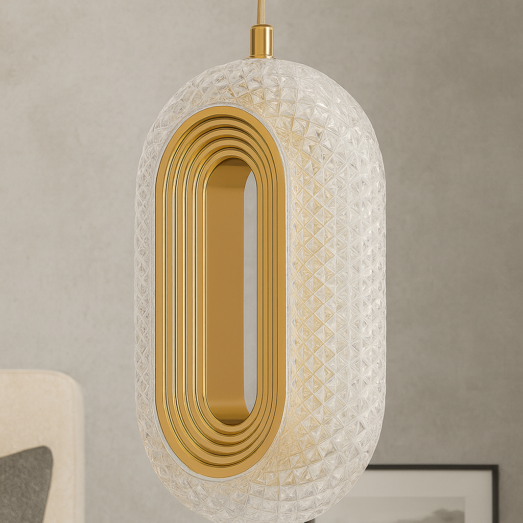 Decorative pendant light with gold interior and textured glass cover on a neutral background
