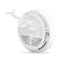 White smoke detector on a white background