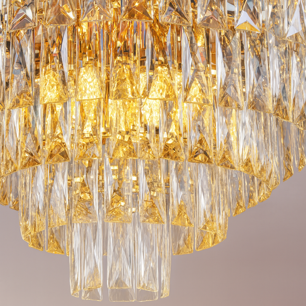 Luxurious crystal chandelier with gold and clear glass on a neutral background