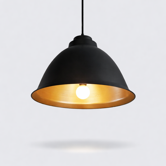 Black pendant light with gold interior on a white background