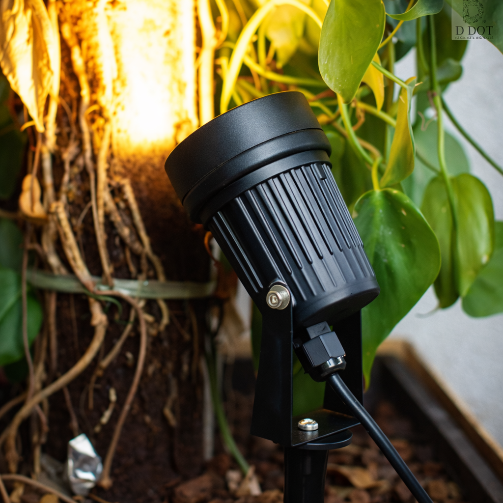 “Modern outdoor LED spotlight with adjustable stake for easy installation in gardens.”