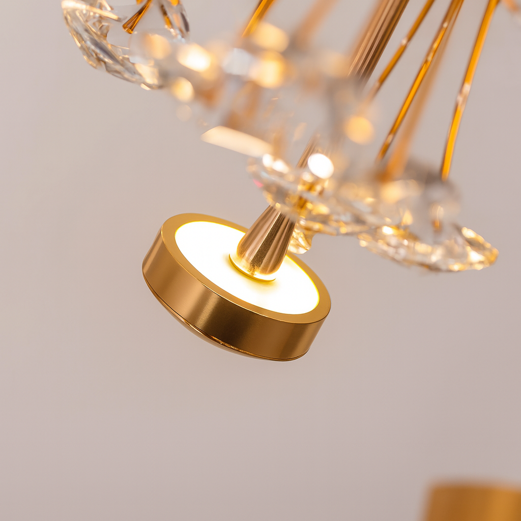 Luxury crystal chandelier lamp detail showing warm golden illumination