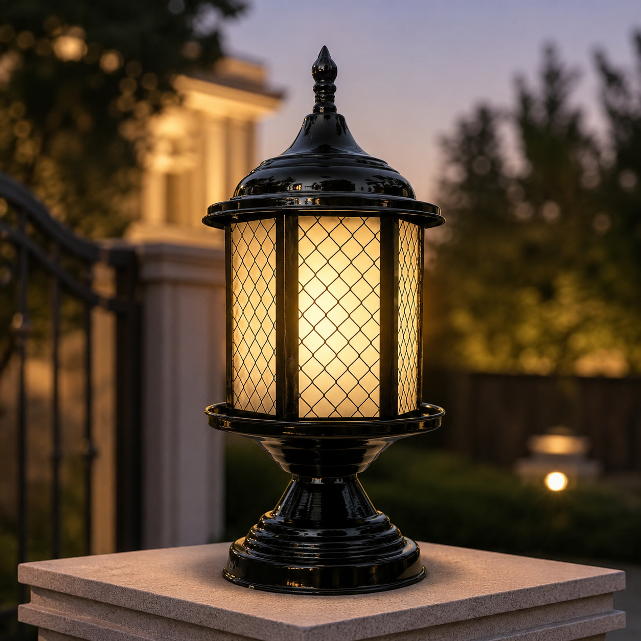 Decorative outdoor lantern with warm glow on a stone surface at dusk.