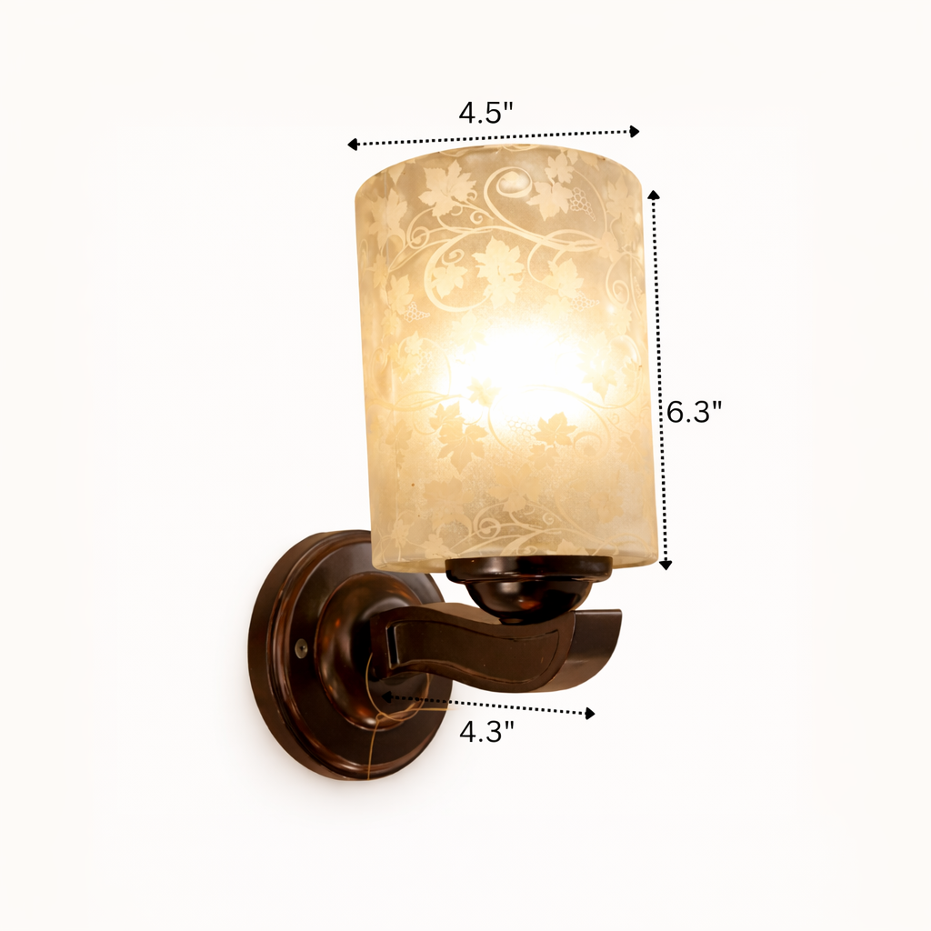 Wall-mounted light fixture with decorative glass shade and dimensions indicated.