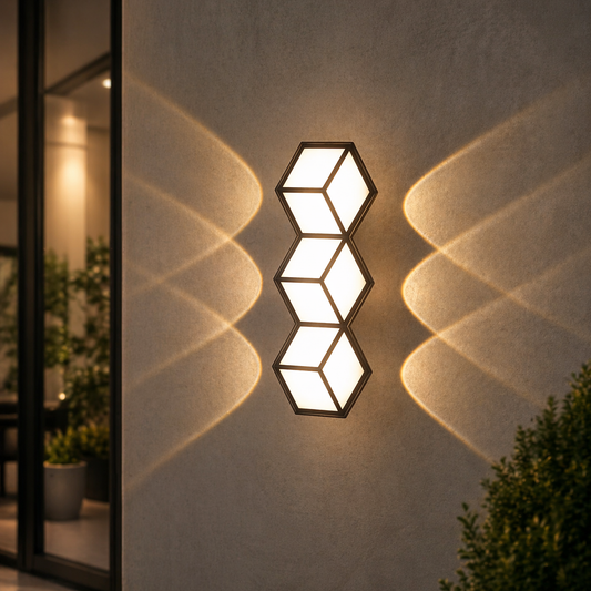 Geometric wall light fixture casting shadows on a wall