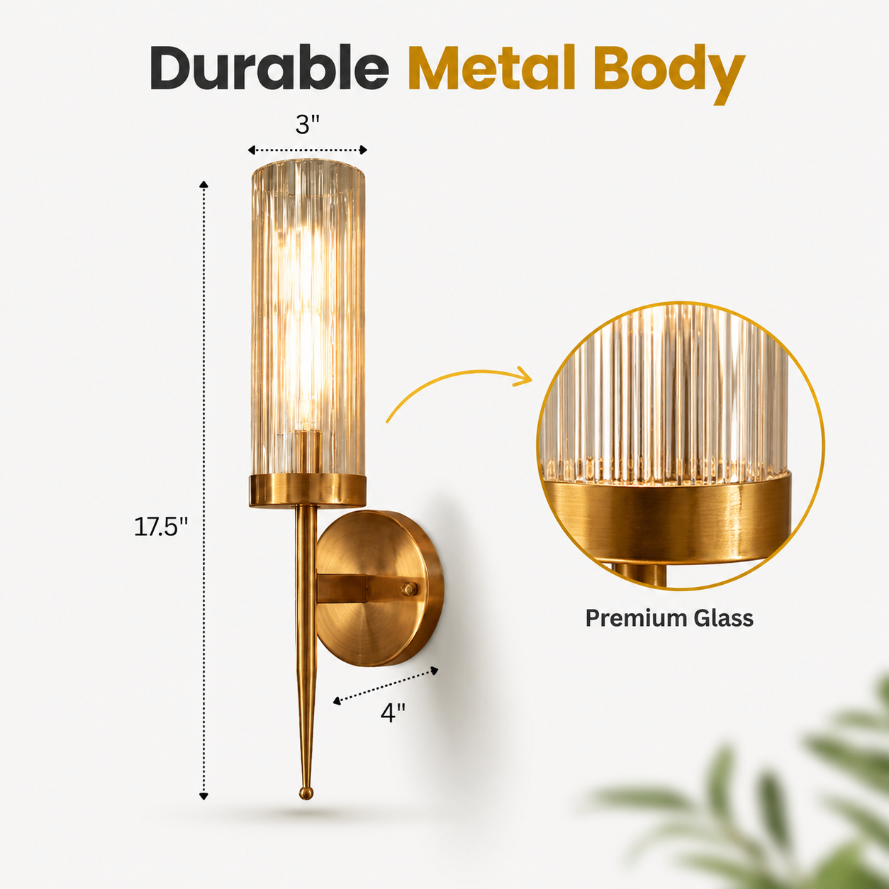 Gold wall sconce with dimensions and material details on a white background
