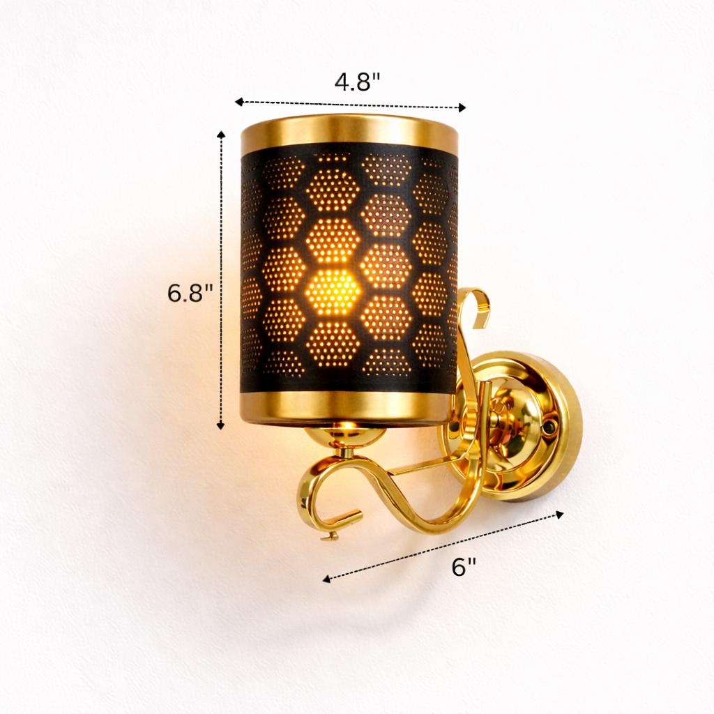 Gold wall sconce with honeycomb design and dimensions on a white background