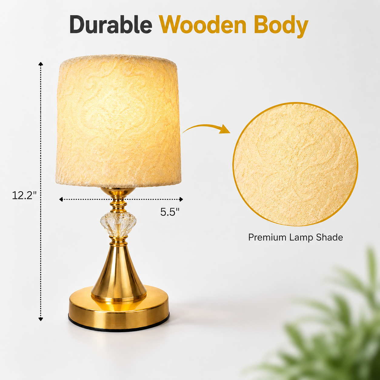 Gold table lamp with textured shade and measurements on a white background