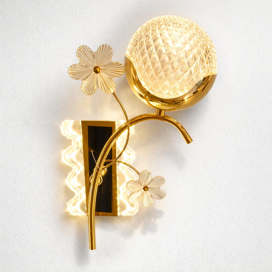 Gold LED wall chandelier with textured glass and floral accents