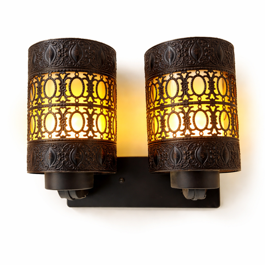 Decorative wall light fixture with intricate metal design indoors