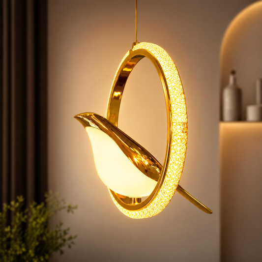 Gold pendant light fixture with a warm glow in a home setting