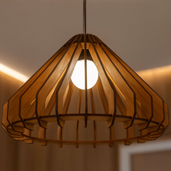 Wooden pendant light with a warm glow against a neutral background