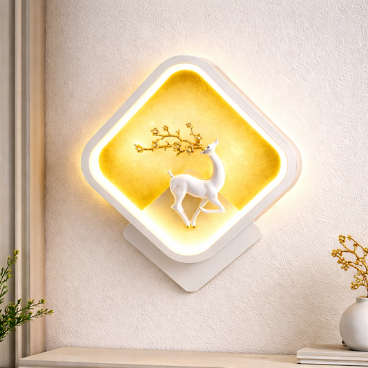 modern LED wall light with deer design glowing warmly