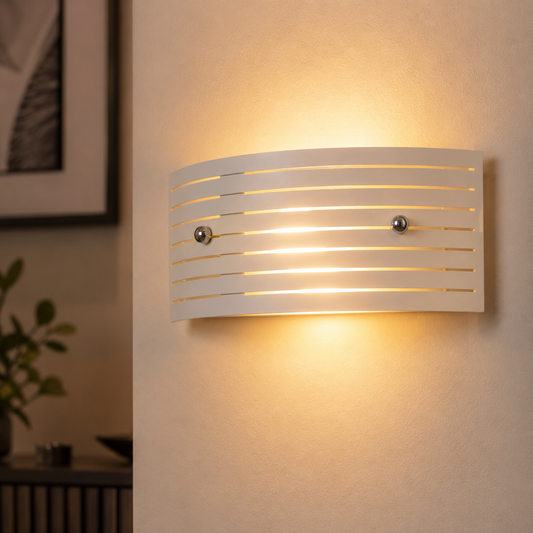 Wall-mounted light fixture on a wall with a blurred background