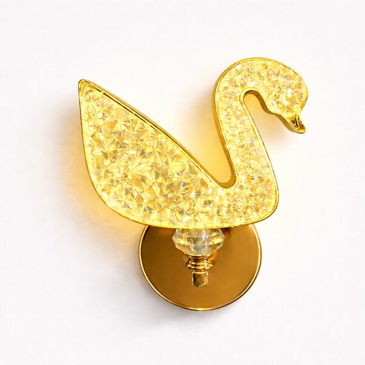 Crystal swan LED wall light with gold finish and warm glow