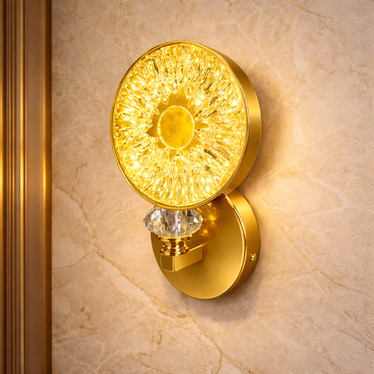 modern gold crystal wall light mounted on luxury marble wall