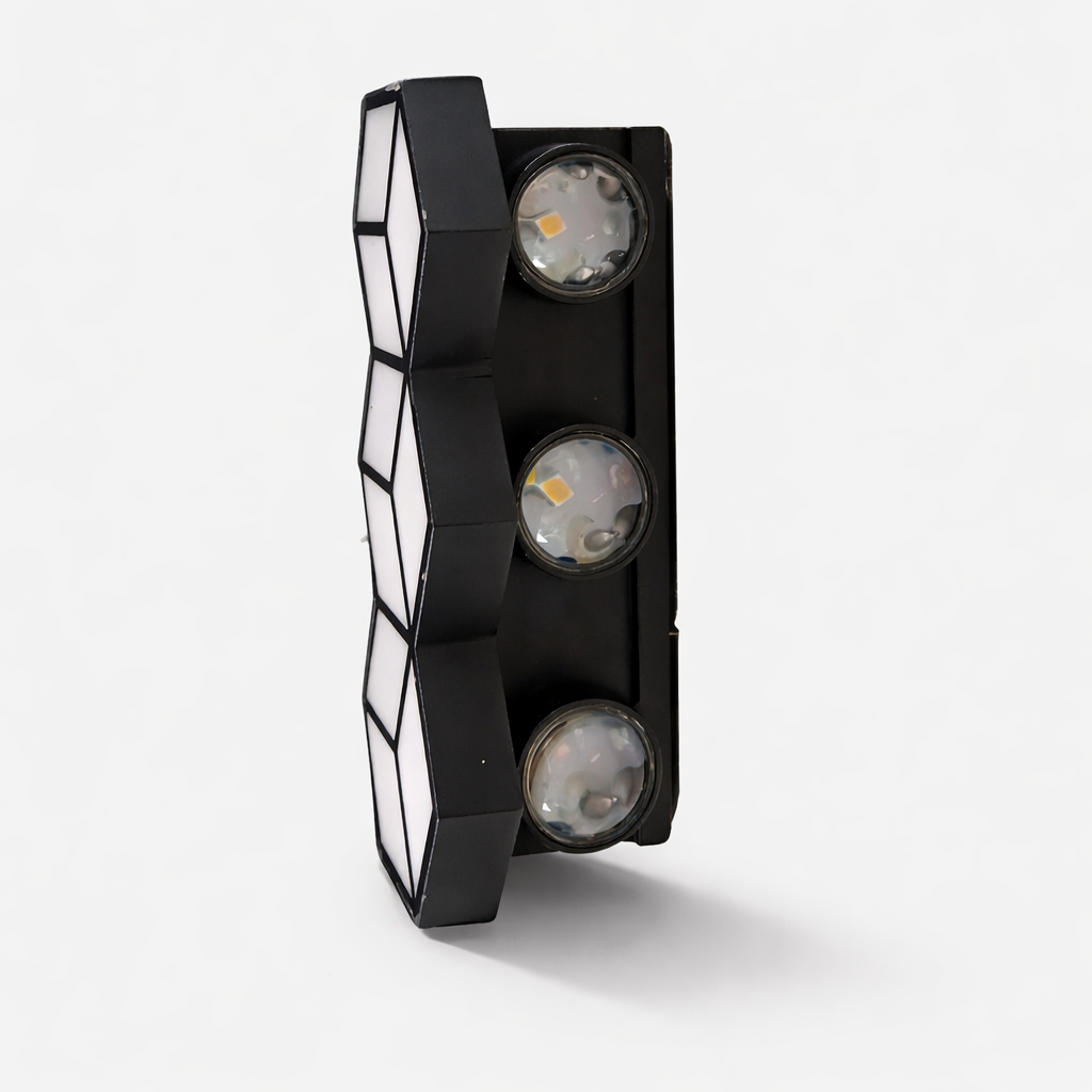 Modern wall light fixture with black frame and glass shades on a white background