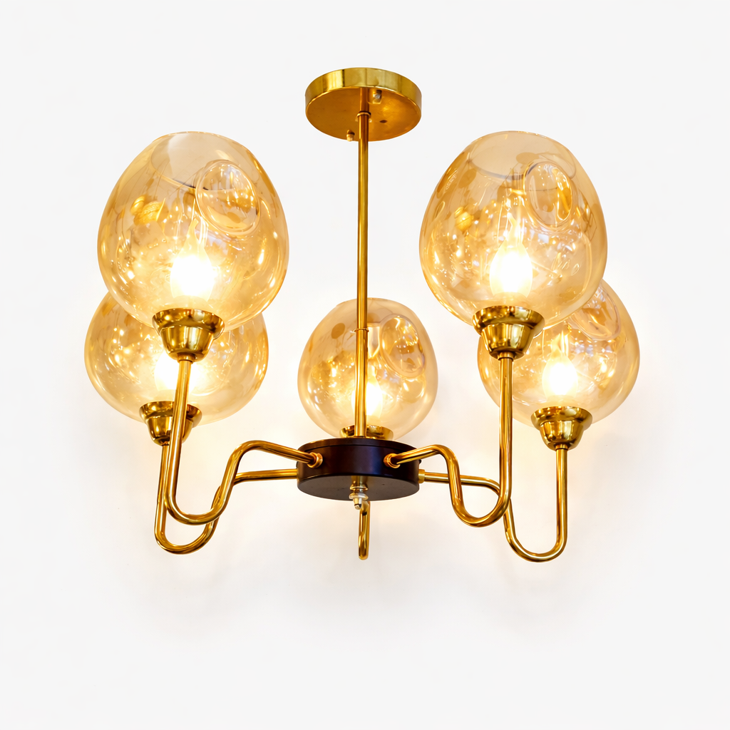 Gold LED chandelier with amber glass shades for living room